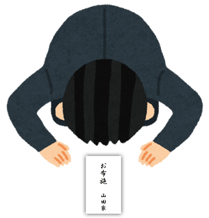 お布施を渡す檀家